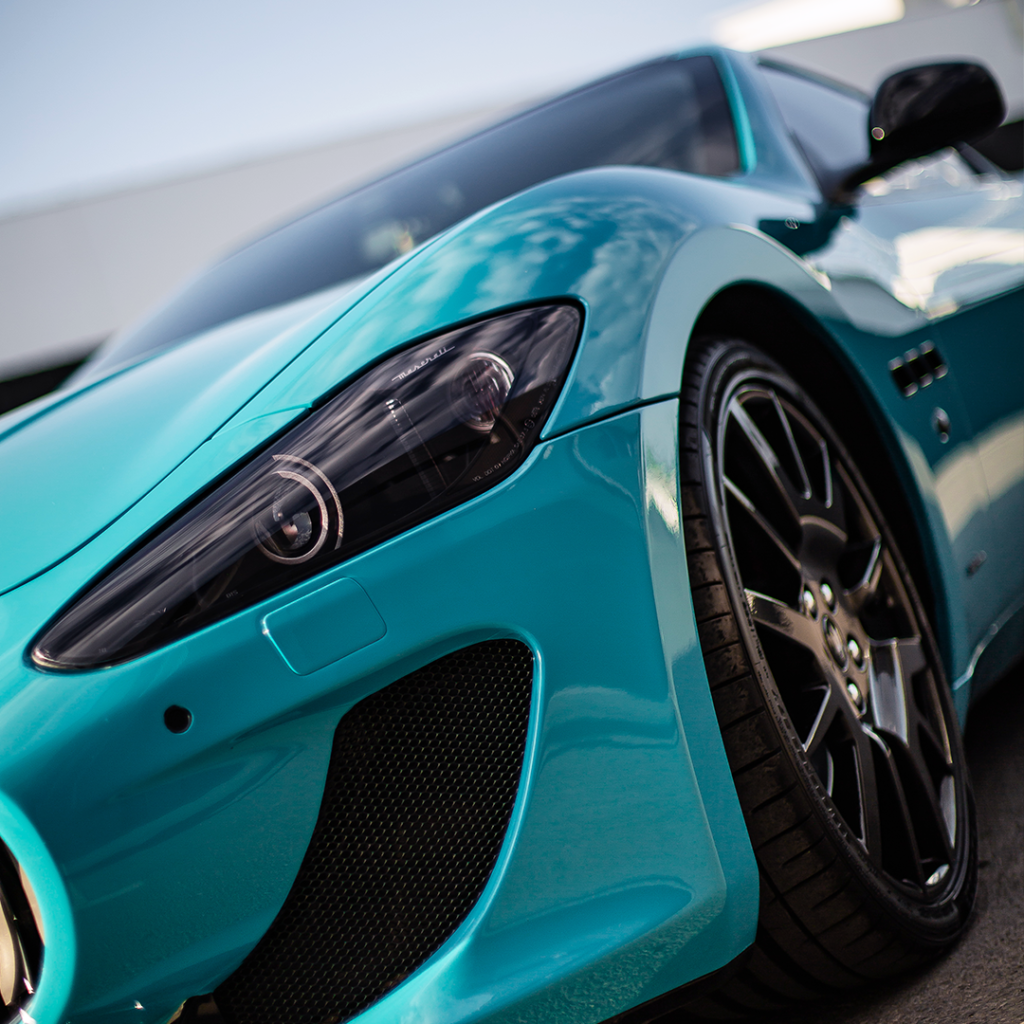 Maserati wrapped in Miami Blue paint protection film at Alpine PPF