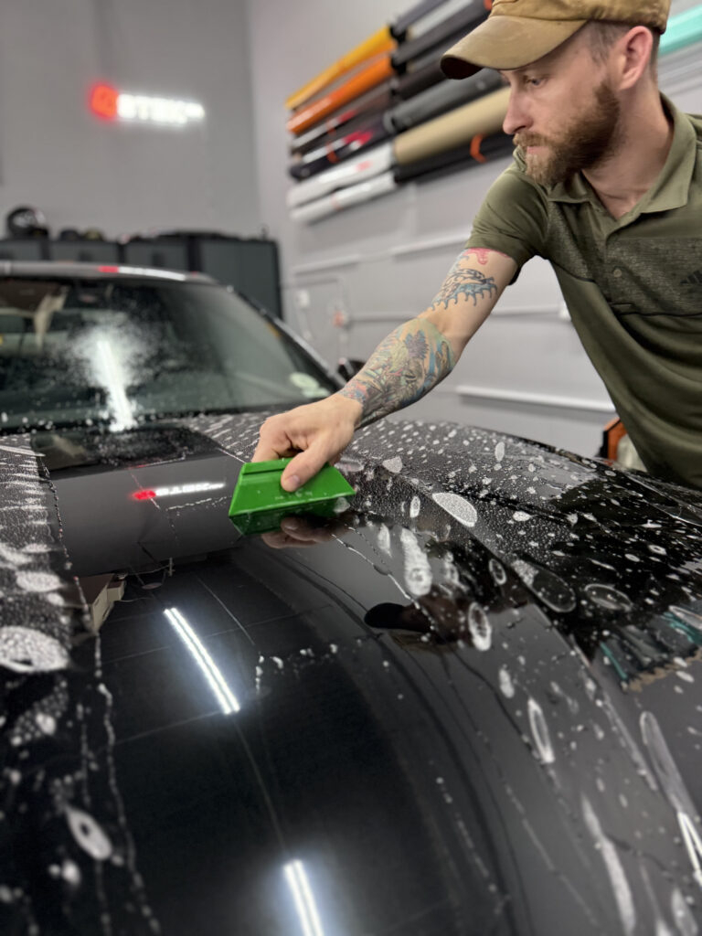 Clear bra paint protection film ppf installation on a 2024 Audi RS5 in Arvada Colorado by Alpine PPF.