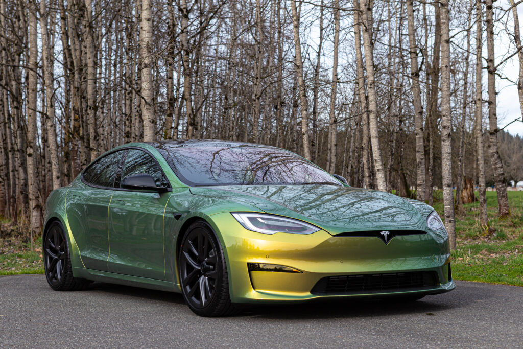 Tesla Model S wrapped in color shift green paint protection film in Denver